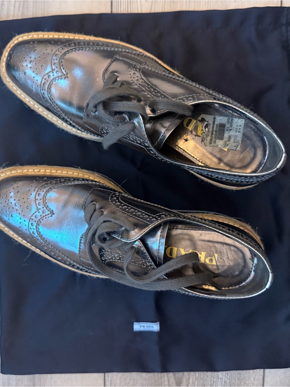 Prada Black Leather Wingtip Derbys with Contrast Welt